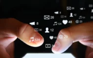 Finger hovering over a phone screen