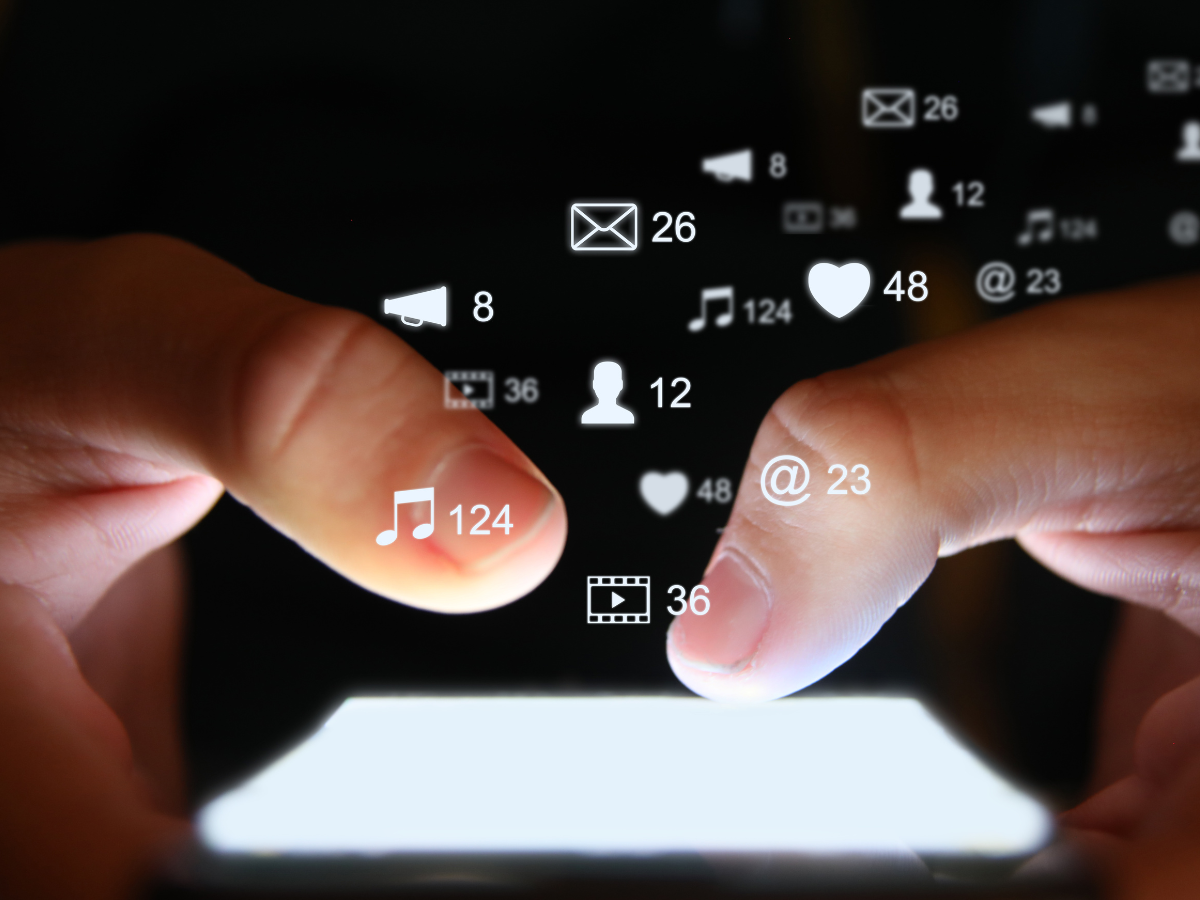 Finger hovering over a phone screen